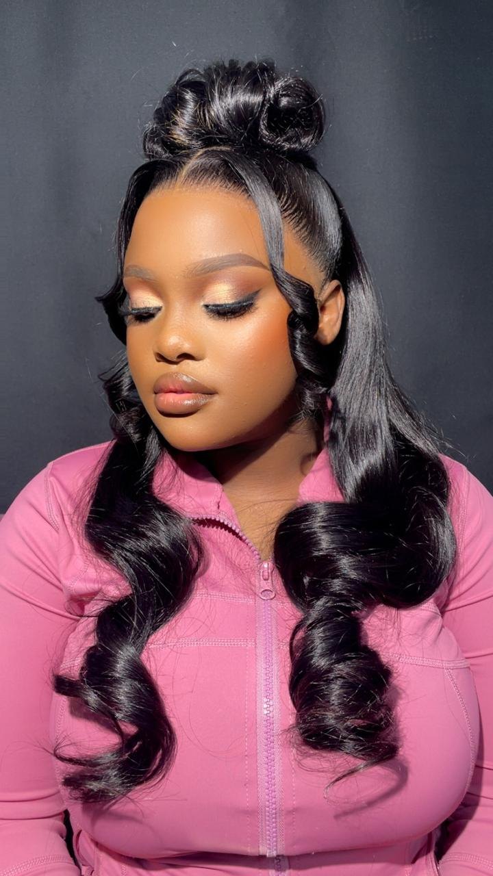 Knotless braids styled at Magnolia Hair & Beauty